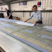 Peter Sanders having a close inspection on the latest scrubs being cut for the frontline. #withlovex
