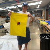 Laurie Saunders, who is our spinnaker guru, showing off the latest scrub bags. #withlovex